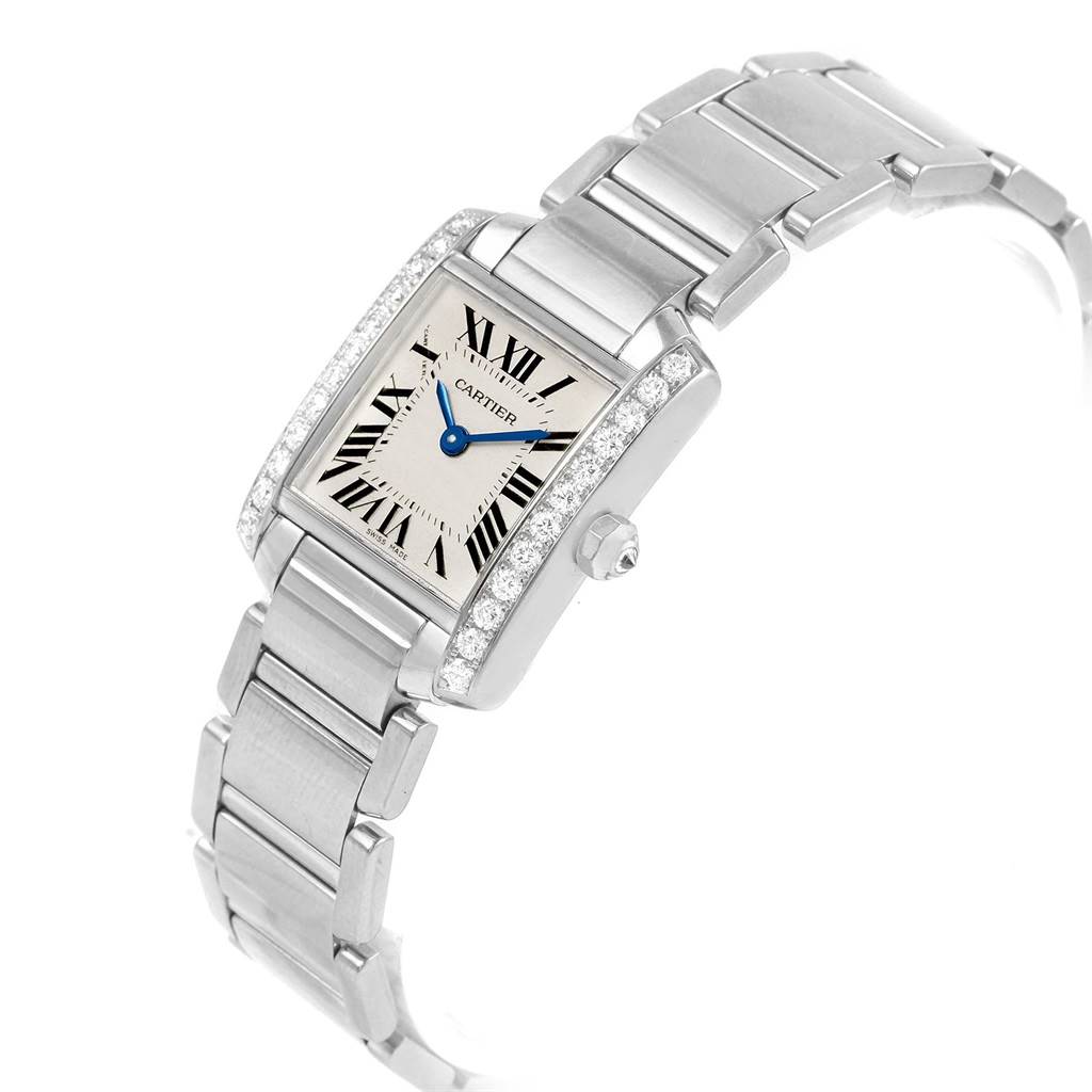 The Cartier Tank Française watch is shown at a slight angle, highlighting its rectangular dial, bracelet, and side crown.