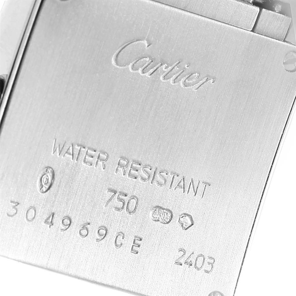 The image shows the back case of a Cartier Tank Francaise WE1002S3 Women's White Gold Silver Dial WE1002S3 Women's White Gold Silver Dial watch, featuring engravings and specifications.