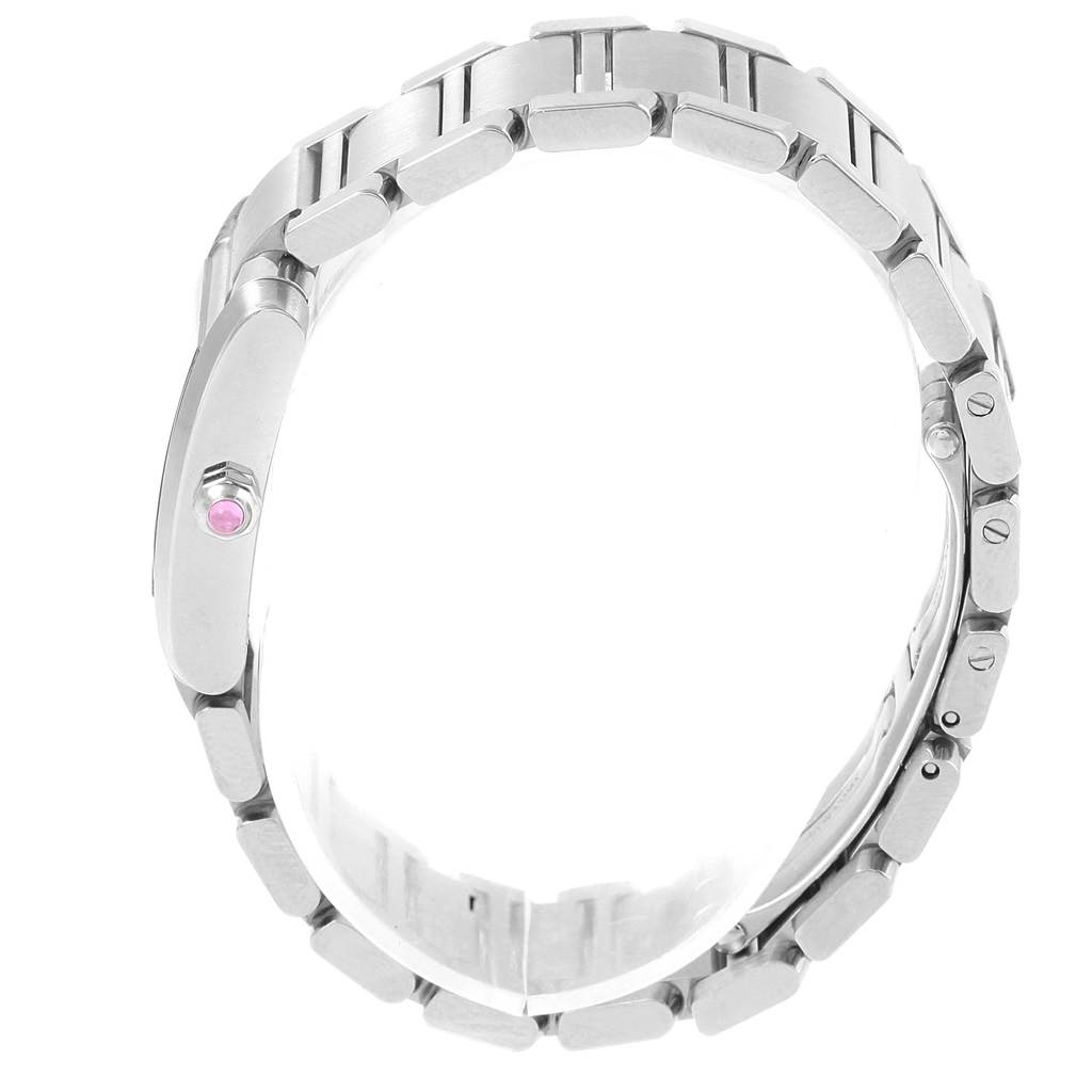 The image shows the side view of the Tank Francaise by Cartier, highlighting its bracelet links and beveled crown with a pink cabochon.