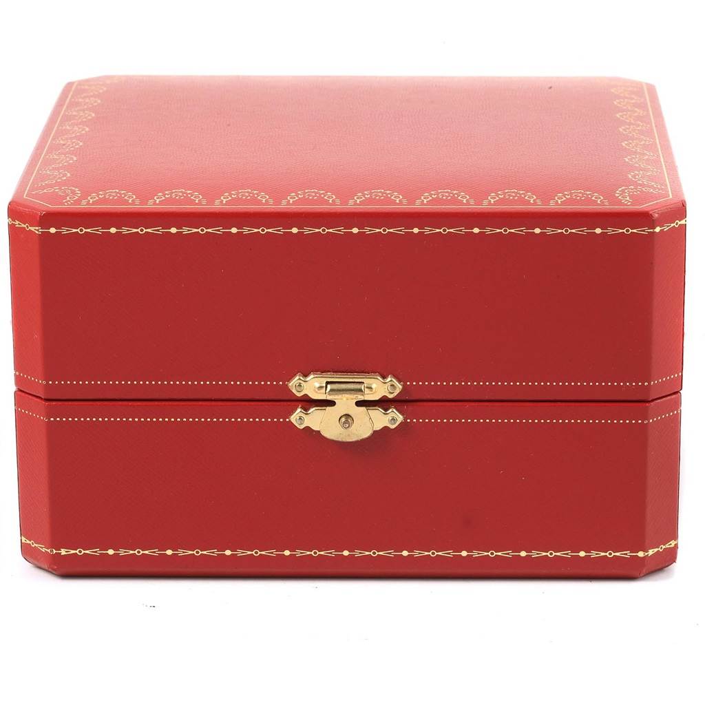 The image shows a closed red Cartier watch box for the Tank Francaise model, featuring a gold clasp and decorative trim.
