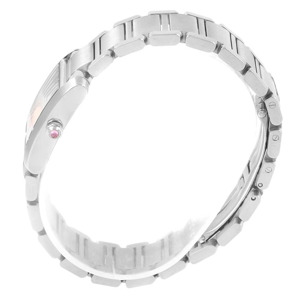 The image shows a Cartier Tank Francaise W51028Q3 Women's Stainless Steel Mother of Pearl Dial W51028Q3 Women's Stainless Steel Mother of Pearl Dial watch from a side angle, highlighting its bracelet and crown with a pink gemstone.