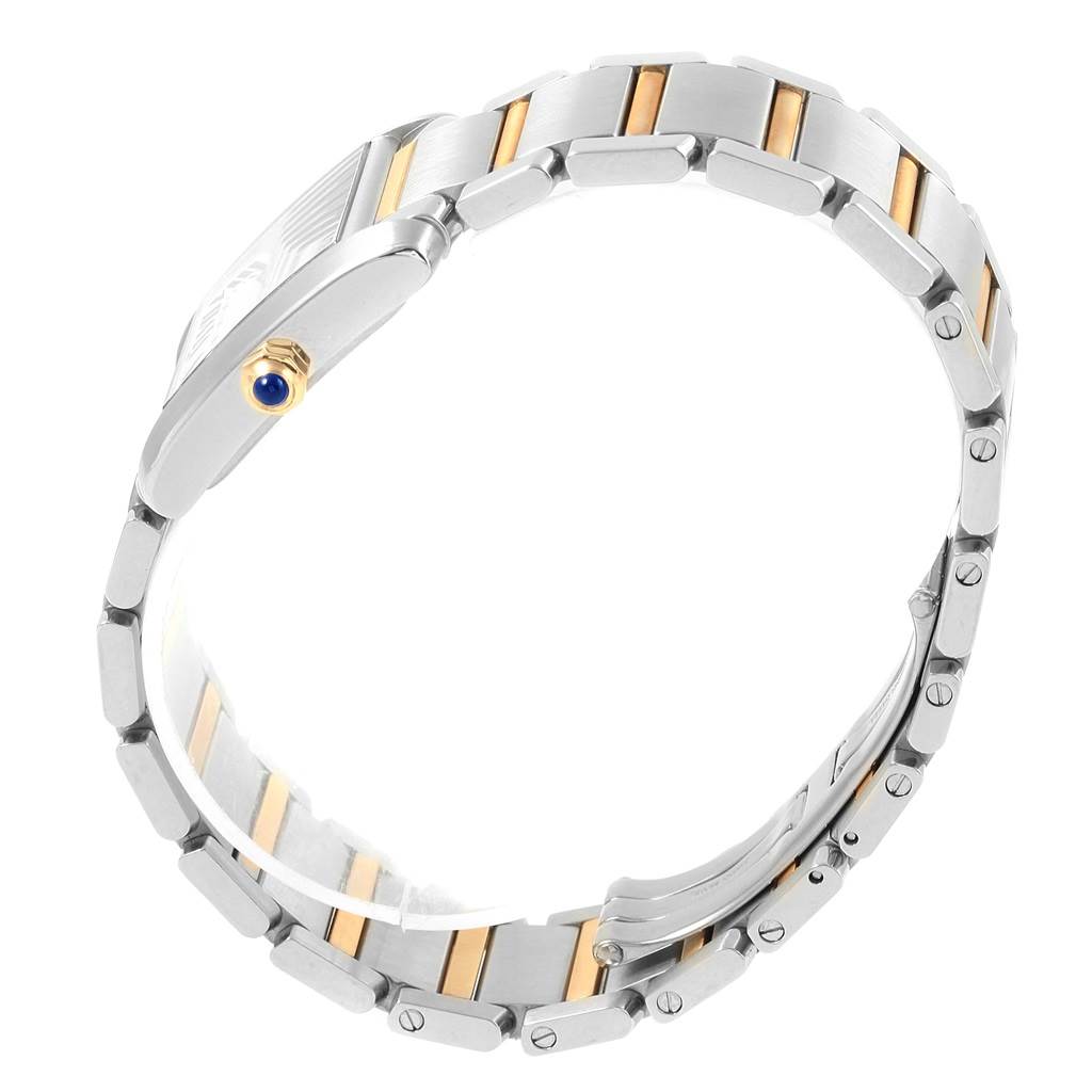 This image shows a side view of the band and casing of a Cartier Tank Francaise W51012Q4 Women's Steel and Gold (two tone) Silver Dial W51012Q4 Women's Steel and Gold (two tone) Silver Dial watch with a visible crown.