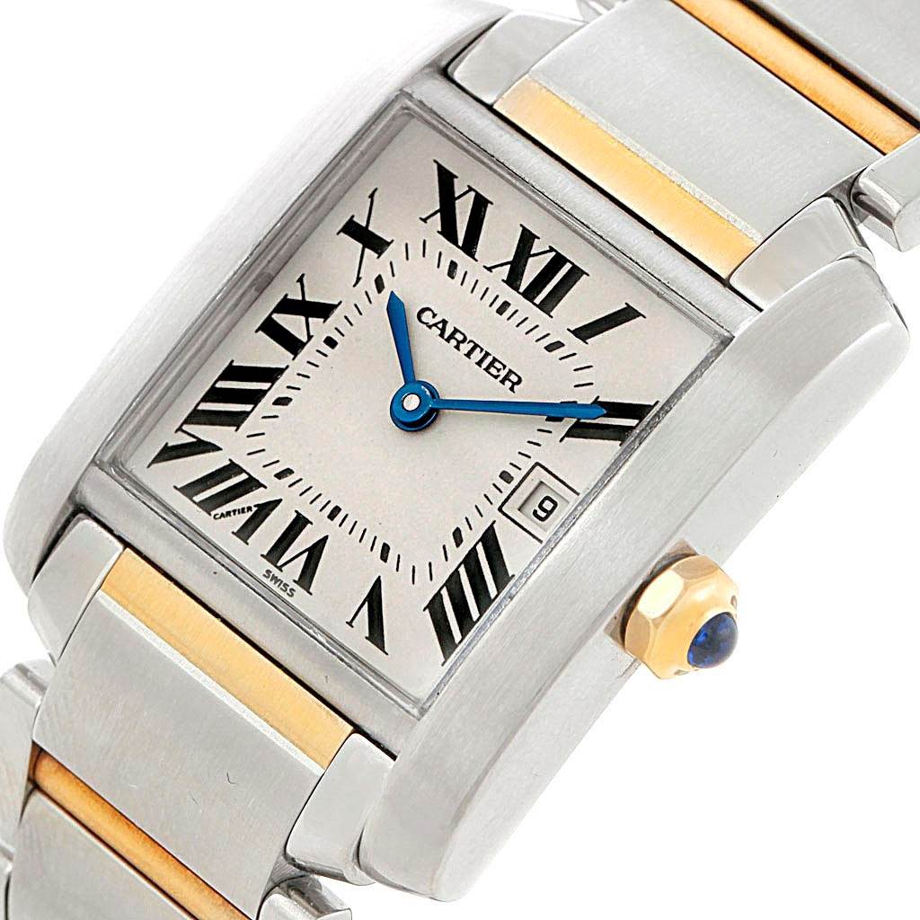 The image shows a close-up angled view of the Cartier Tank Française watch face and part of its bracelet.