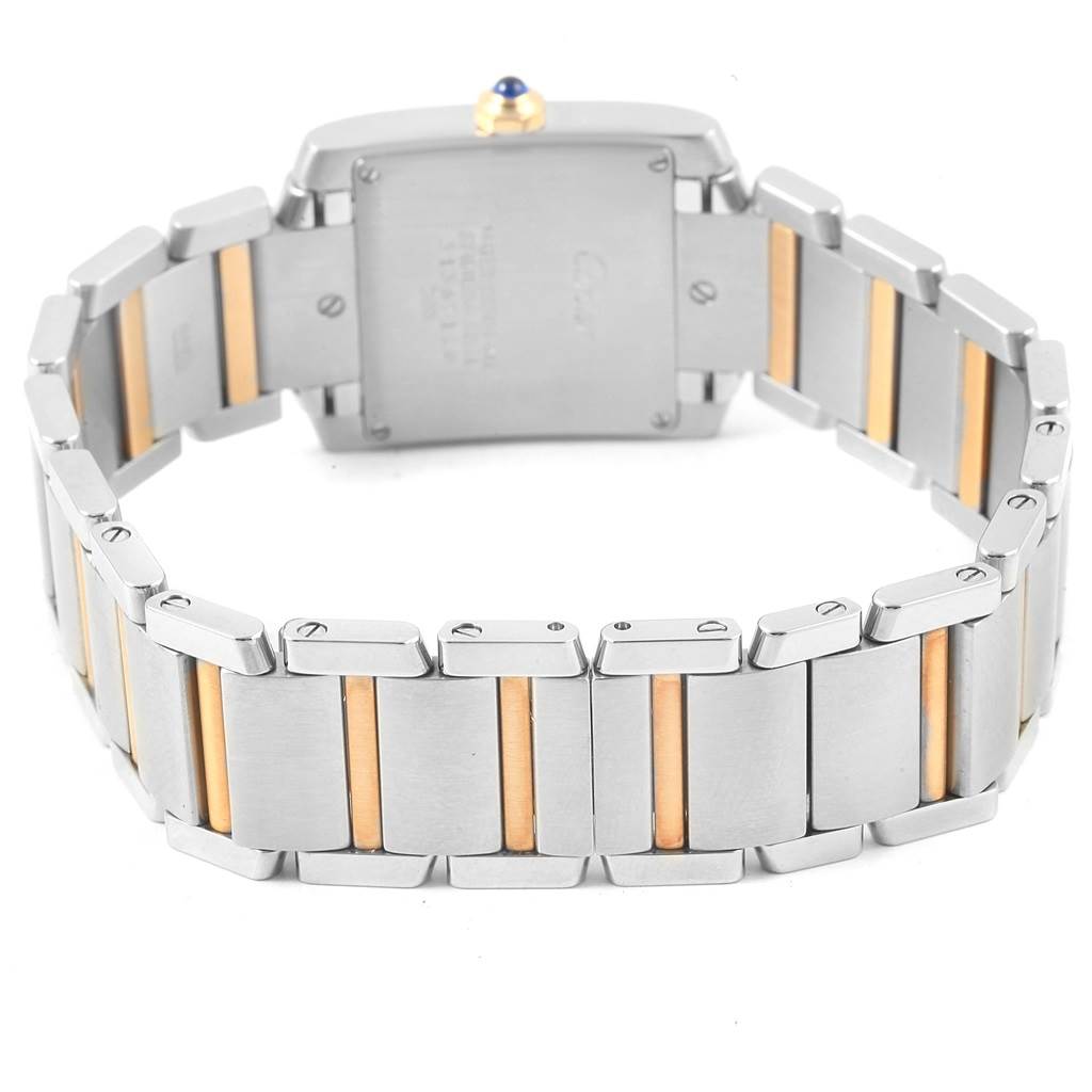 This image shows the back and bracelet of a Cartier Tank Francaise W51012Q4 Women's Steel and Gold (two tone) Silver Dial W51012Q4 Women's Steel and Gold (two tone) Silver Dial watch in a mix of silver and gold tones.