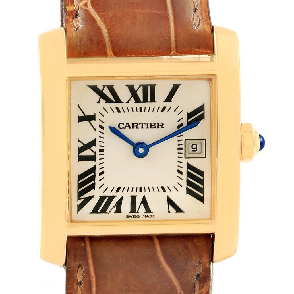 The image shows a front view of the Cartier Tank Francaise W50014N2 Women's Yellow Gold Silver Dial W50014N2 Women's Yellow Gold Silver Dial watch, highlighting its rectangular dial, Roman numerals, and leather strap.