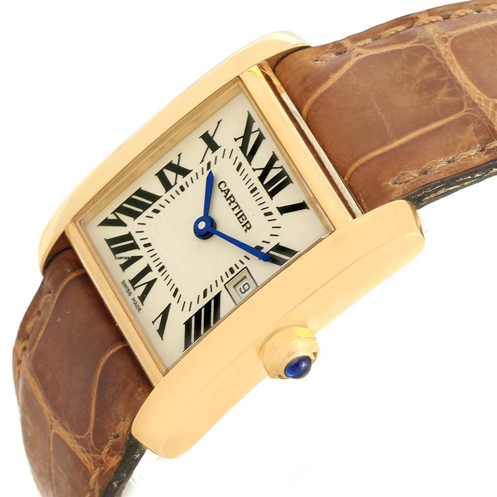 This image shows a close-up, angled view of the Cartier Tank Française watch, focusing on the face, crown, and part of the strap.
