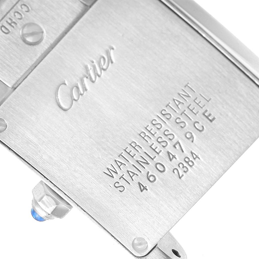 The image shows the back case of the Cartier Tank Française watch, highlighting the brand name and model details.