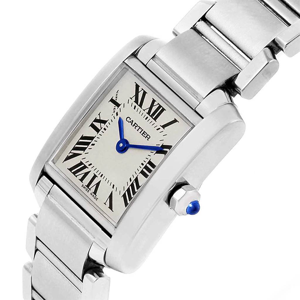 The image shows a Cartier Tank Française watch at an angle highlighting its face, crown, and part of the metal bracelet.