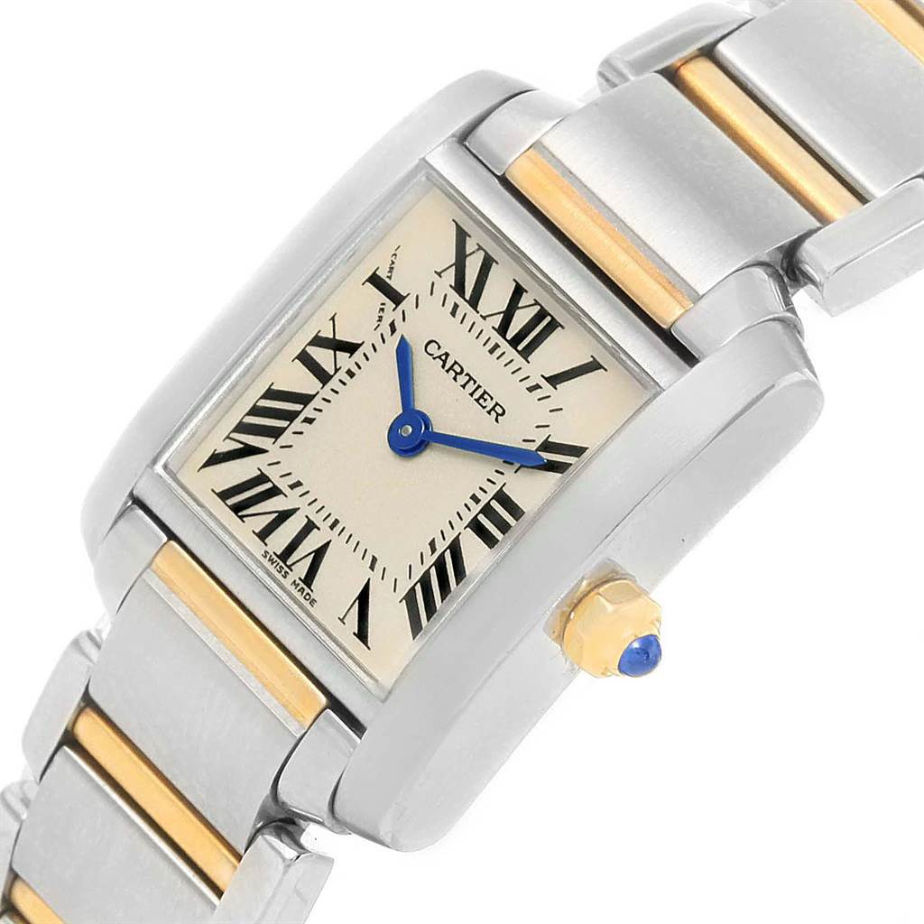 The image shows a close-up of the face and bracelet of a Cartier Tank Francaise W51007Q4 Women's Steel and Gold (two tone) Silver Dial W51007Q4 Women's Steel and Gold (two tone) Silver Dial watch, highlighting its Roman numerals and blue hands.