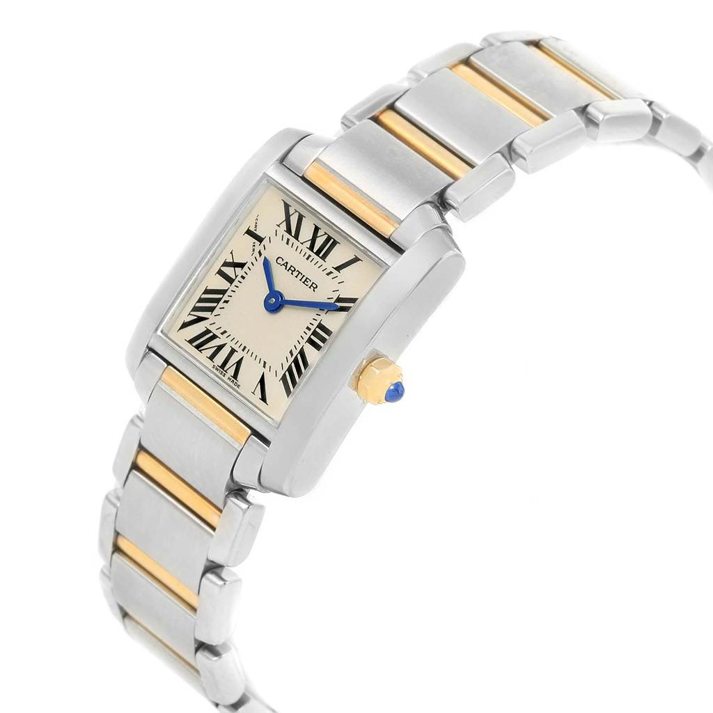 The Cartier Tank Française watch is shown from a slight side angle, highlighting the face, crown, and part of the bracelet.