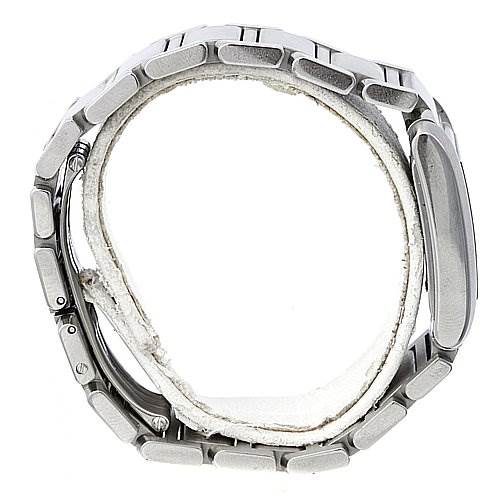 This image shows a side view of a Cartier Tank Française watch, focusing on the metal bracelet and case.