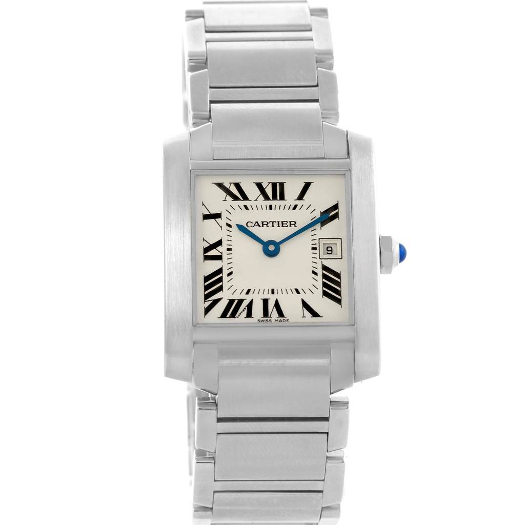 The image shows a front view of the Cartier Tank Française watch, highlighting the face with Roman numerals, metal bracelet, and crown with a blue cabochon.