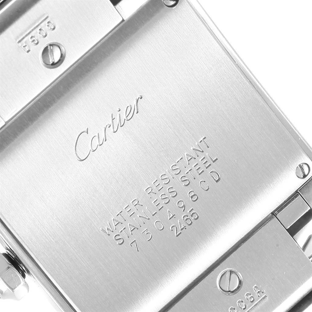 This image shows the back case of a Cartier Tank Francaise W51011Q3 Women's Stainless Steel Silver Dial W51011Q3 Women's Stainless Steel Silver Dial watch, highlighting the brand engraving and water resistance information.