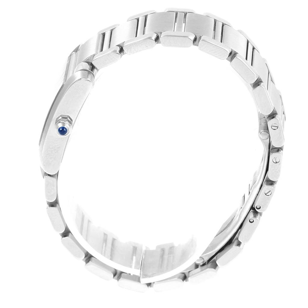 The image shows a side view of the Cartier Tank Française watch, highlighting the bracelet and crown.