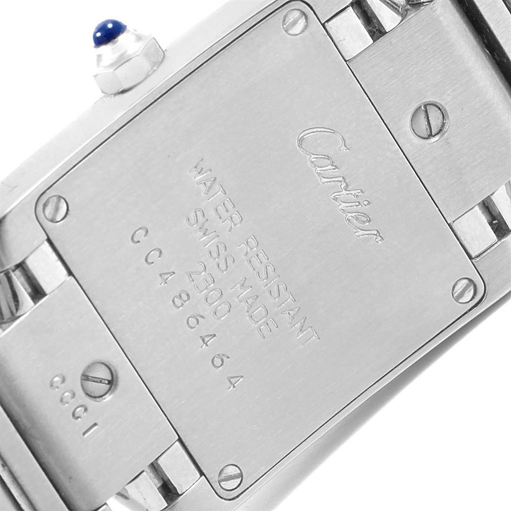 This image shows the back case and bracelet of a Cartier Tank Française watch, including the model number and water resistance details.