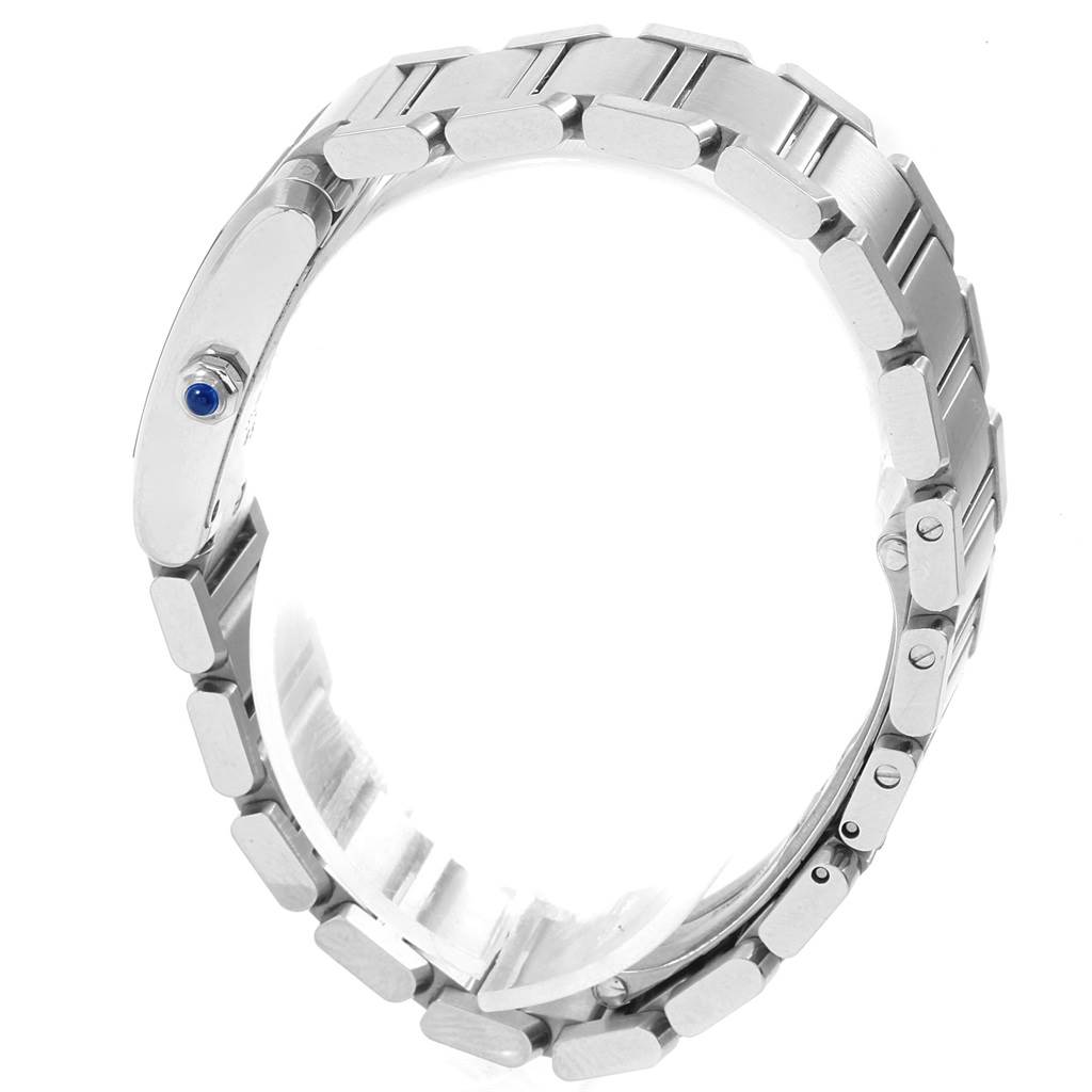 This image shows the side view of the bracelet of a Cartier Tank Française watch, highlighting the metal links and the blue cabochon crown.