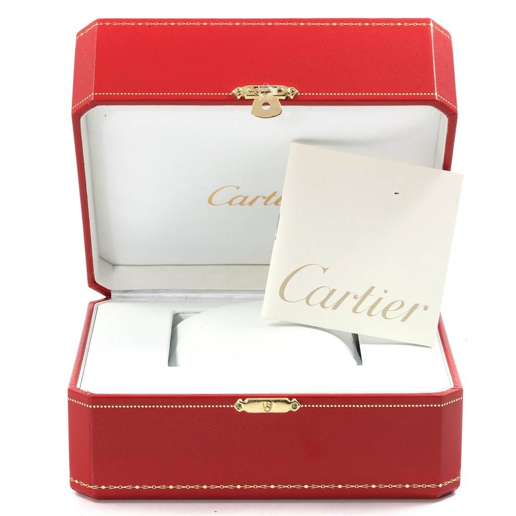 A Cartier Tank Francaise W51034Q3 Women's Stainless Steel Mother of Pearl Dial W51034Q3 Women's Stainless Steel Mother of Pearl Dial watch's red box and accompanying booklet are shown from a front angle.