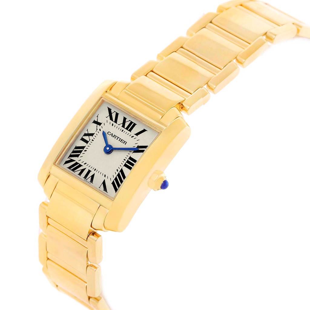 This image shows a side and front angle of the Cartier Tank Française watch, displaying its gold band and rectangular dial with Roman numerals.