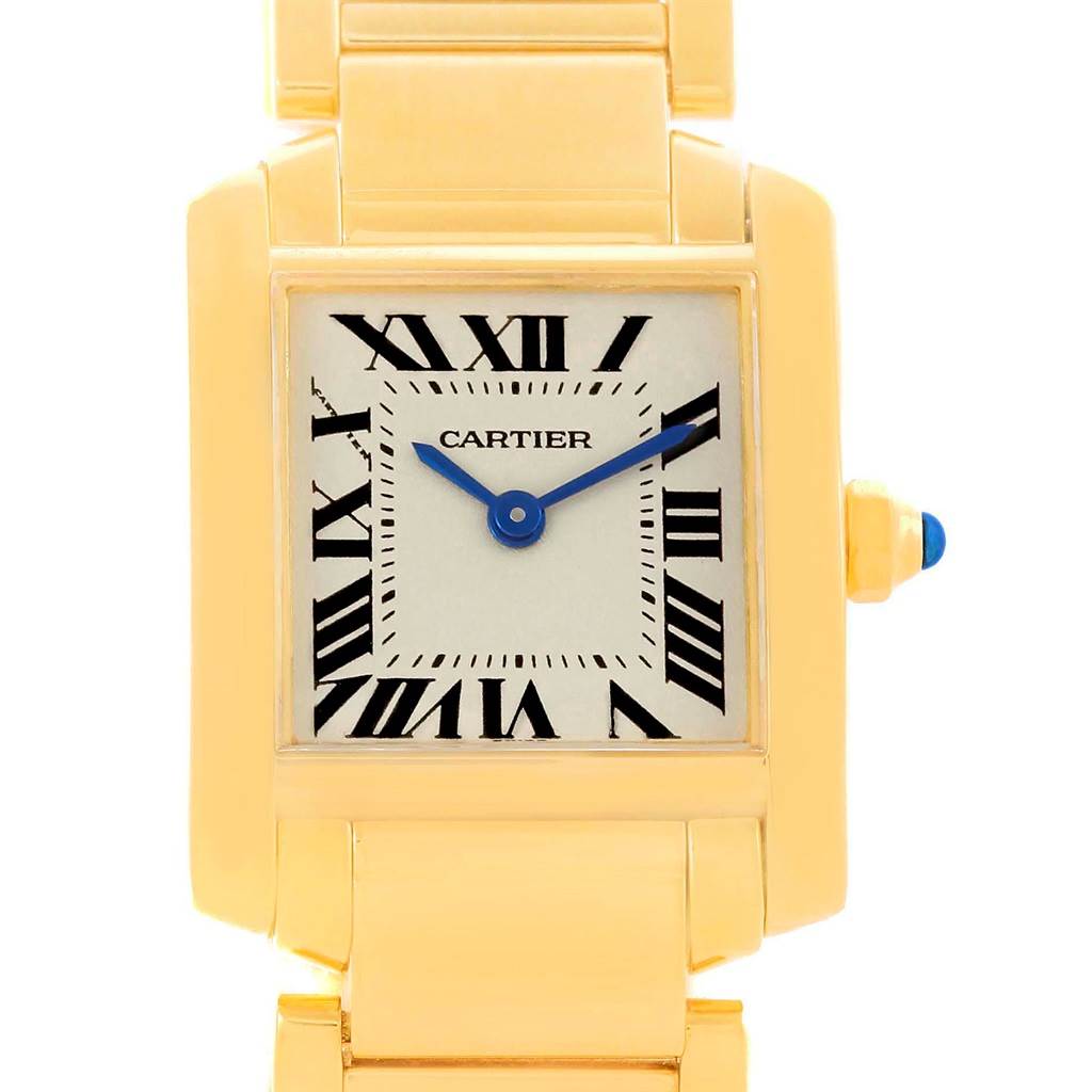 The image shows a frontal view of a Cartier Tank Francaise W50002N2 Women's Yellow Gold Silver Dial W50002N2 Women's Yellow Gold Silver Dial watch, highlighting its square dial, Roman numerals, and metal bracelet.
