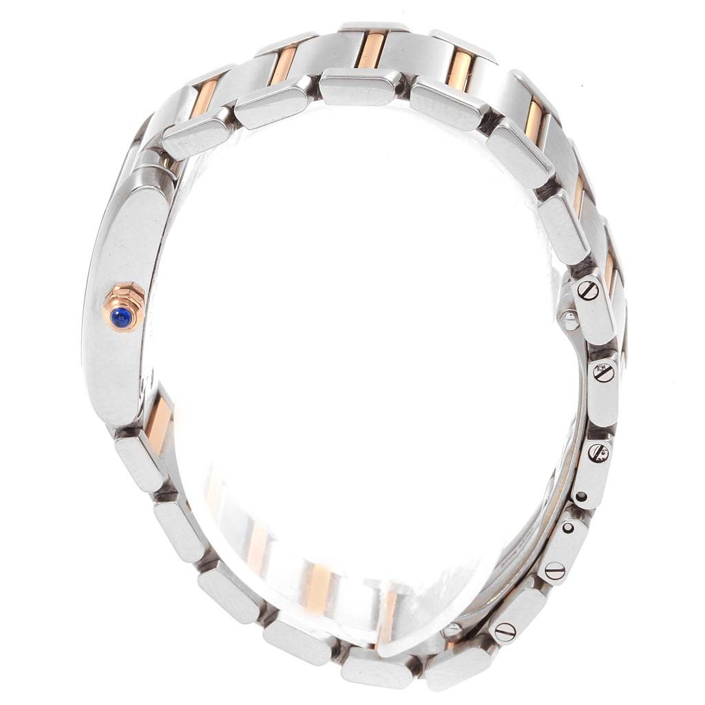 This image shows the side view of the bracelet and crown of the Cartier Tank Française watch.