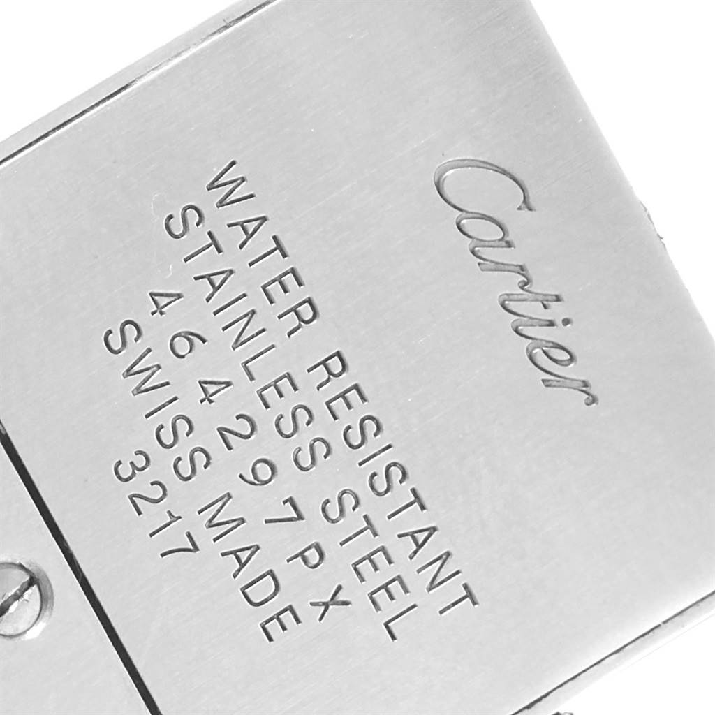 This image shows a close-up of the stainless steel back case of a Cartier Tank Francaise W5010001 Women's Steel and Gold (two tone) Black Dial W5010001 Women's Steel and Gold (two tone) Black Dial watch.