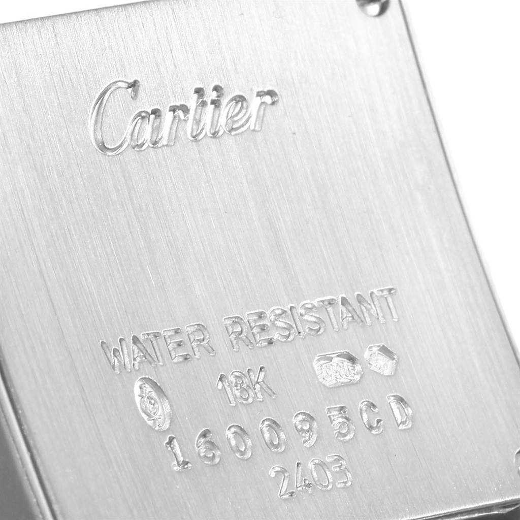 The image shows the back of a Cartier Tank Francaise W50012S3 Women's White Gold Silver Dial W50012S3 Women's White Gold Silver Dial watch, displaying the brand name, water resistance, material, and serial number.