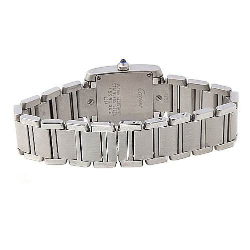 The image shows the reverse side of the Cartier Tank Française watch, highlighting its stainless steel bracelet and case back.