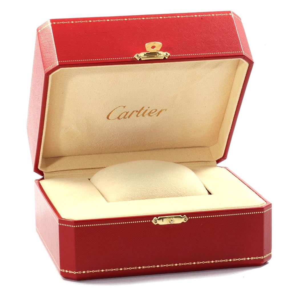 The image shows an open red Cartier watch box for the Tank Francaise model.