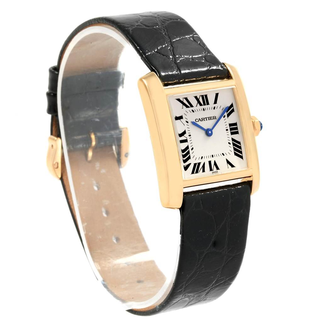This watch, a Cartier Tank Française model, is shown at a slight angle focusing on the dial, bezel, and black leather strap.