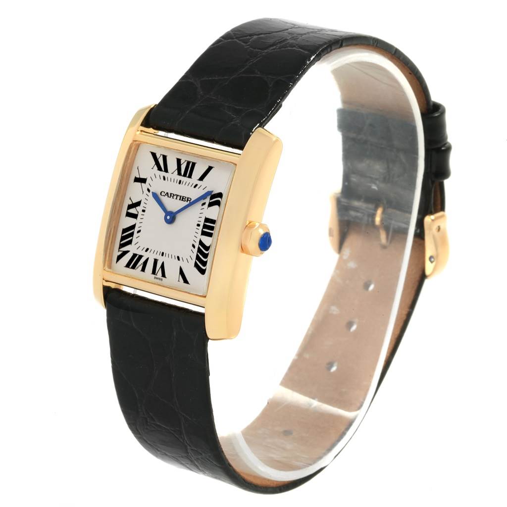 The image shows a Cartier Tank Francaise W50003N2 Women's Yellow Gold Silver Dial W50003N2 Women's Yellow Gold Silver Dial watch at a slight angle, highlighting the face, case, crown, and leather strap.