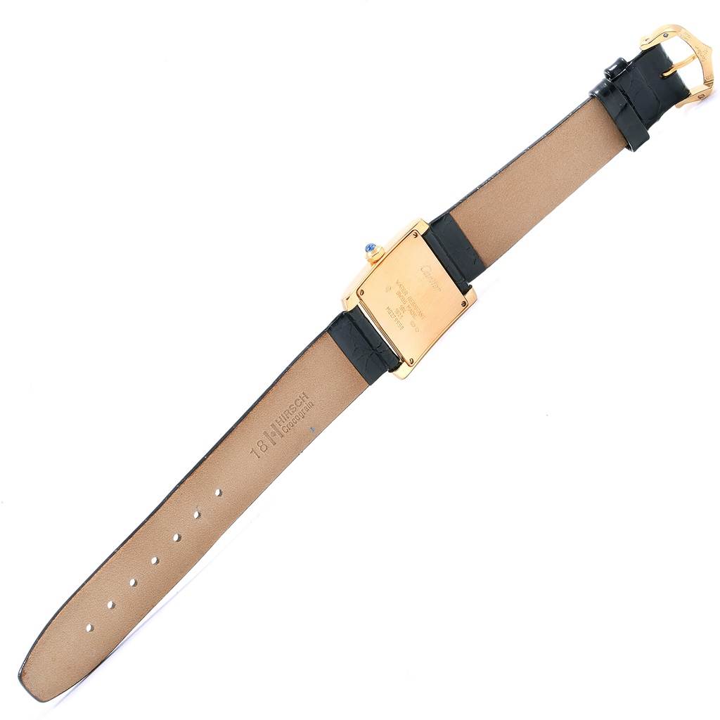 The image shows the backside and clasp of the Tank Francaise model by Cartier, displaying the strap and caseback details.