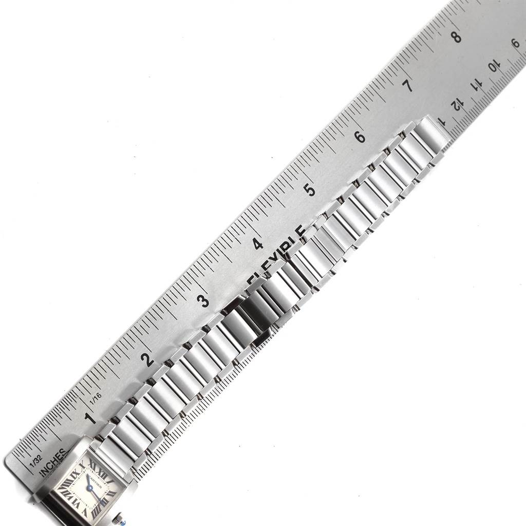 The image shows the side view of the bracelet and face of a Cartier Tank Francaise W51008Q3 Women's Stainless Steel Silver Dial W51008Q3 Women's Stainless Steel Silver Dial watch with a ruler measuring the bracelet length.