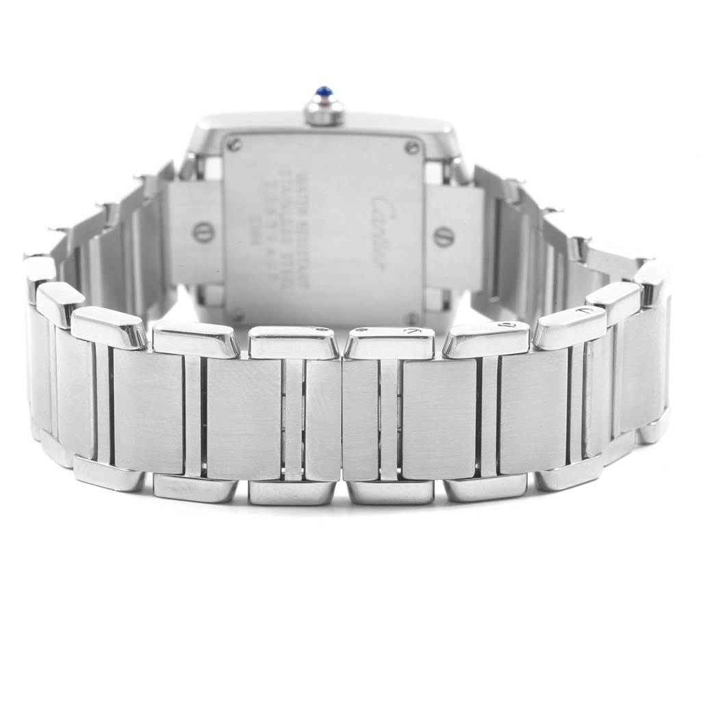 The image shows the back view of the Cartier Tank Francaise W51008Q3 Women's Stainless Steel Silver Dial W51008Q3 Women's Stainless Steel Silver Dial watch, focusing on the metal bracelet and case back.