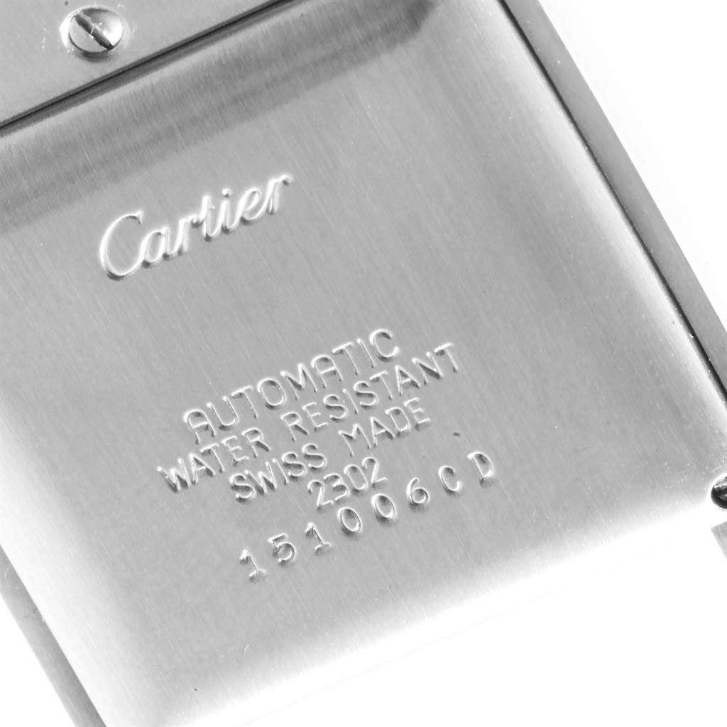 The image shows the back case of a Cartier Tank Francaise W51002Q3 Men
s Stainless Steel Silver Dial W51002Q3 Men
s Stainless Steel Silver Dial watch, displaying brand, model, and specifications.