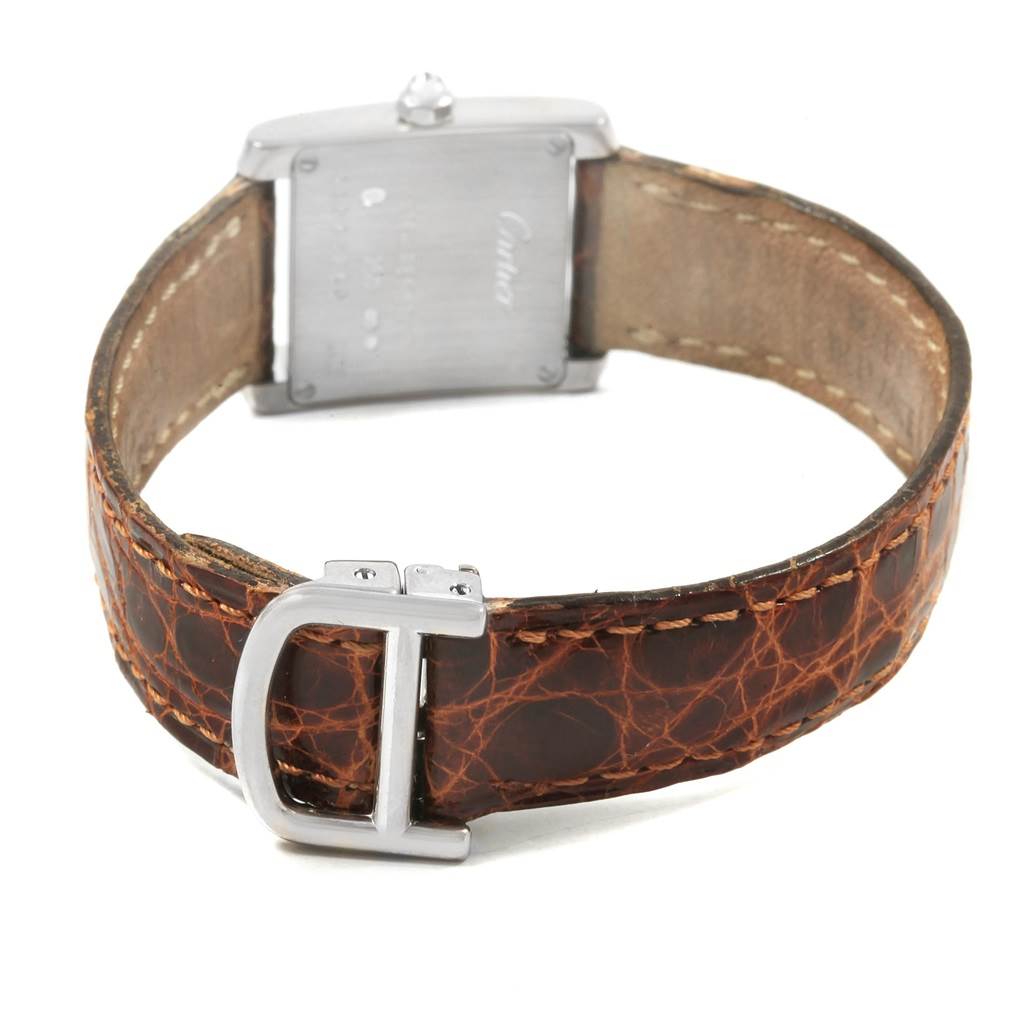 The image shows the back view of a Cartier Tank Francaise WE100231 Women's White Gold Silver Dial WE100231 Women's White Gold Silver Dial watch, featuring its caseback and leather strap with buckle.