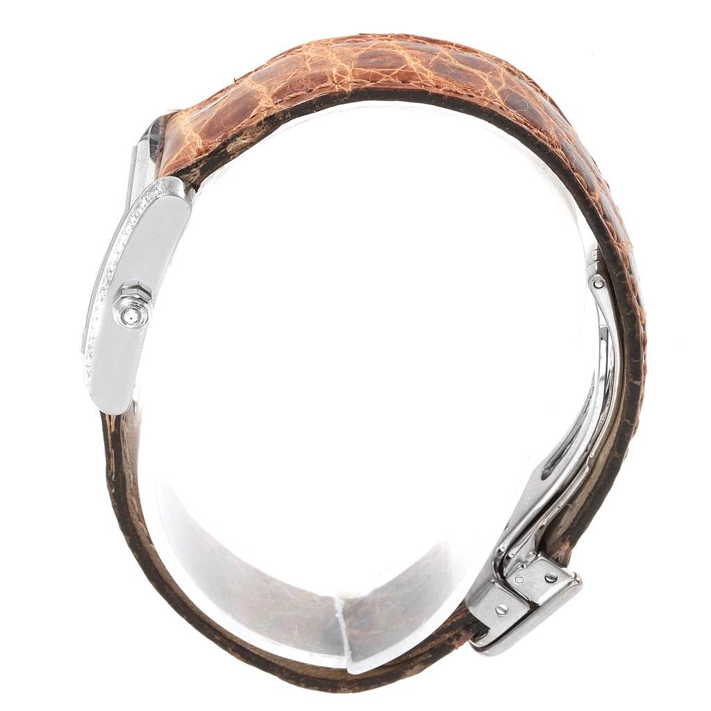 The image shows a side view of the Tank Française watch by Cartier, highlighting the leather strap and side profile of the watch case.