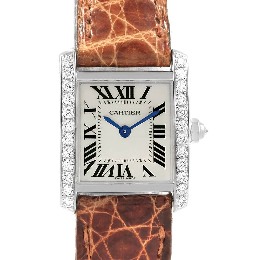 This image shows a frontal view of the Cartier Tank Française watch, highlighting its rectangular face, Roman numerals, and leather strap.