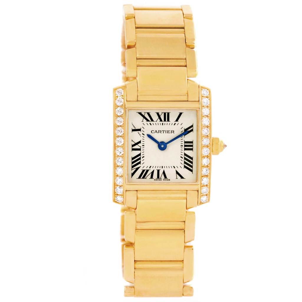 The image shows a Cartier Tank Francaise WE1001R8 Women's Yellow Gold Silver Dial WE1001R8 Women's Yellow Gold Silver Dial watch from a top-down angle, featuring a gold bracelet and a diamond-studded rectangular face.