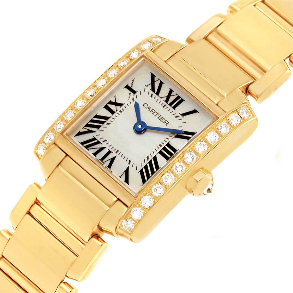 The image shows a close-up view of the Cartier Tank Française watch, displaying the dial, case, crown, and bracelet.