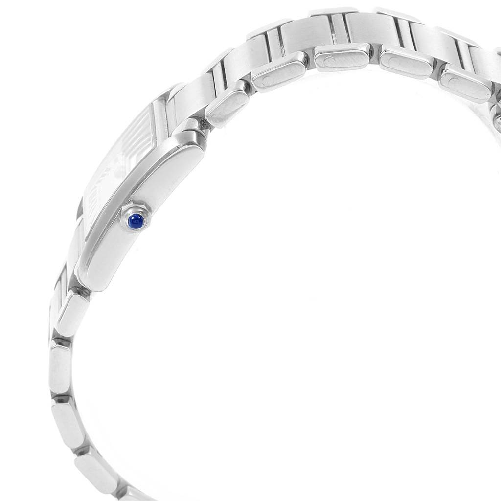 This image shows a side view of a Cartier Tank Francaise W51008Q3 Women's Stainless Steel Silver Dial W51008Q3 Women's Stainless Steel Silver Dial watch, highlighting the bracelet and the crown with a blue cabochon.