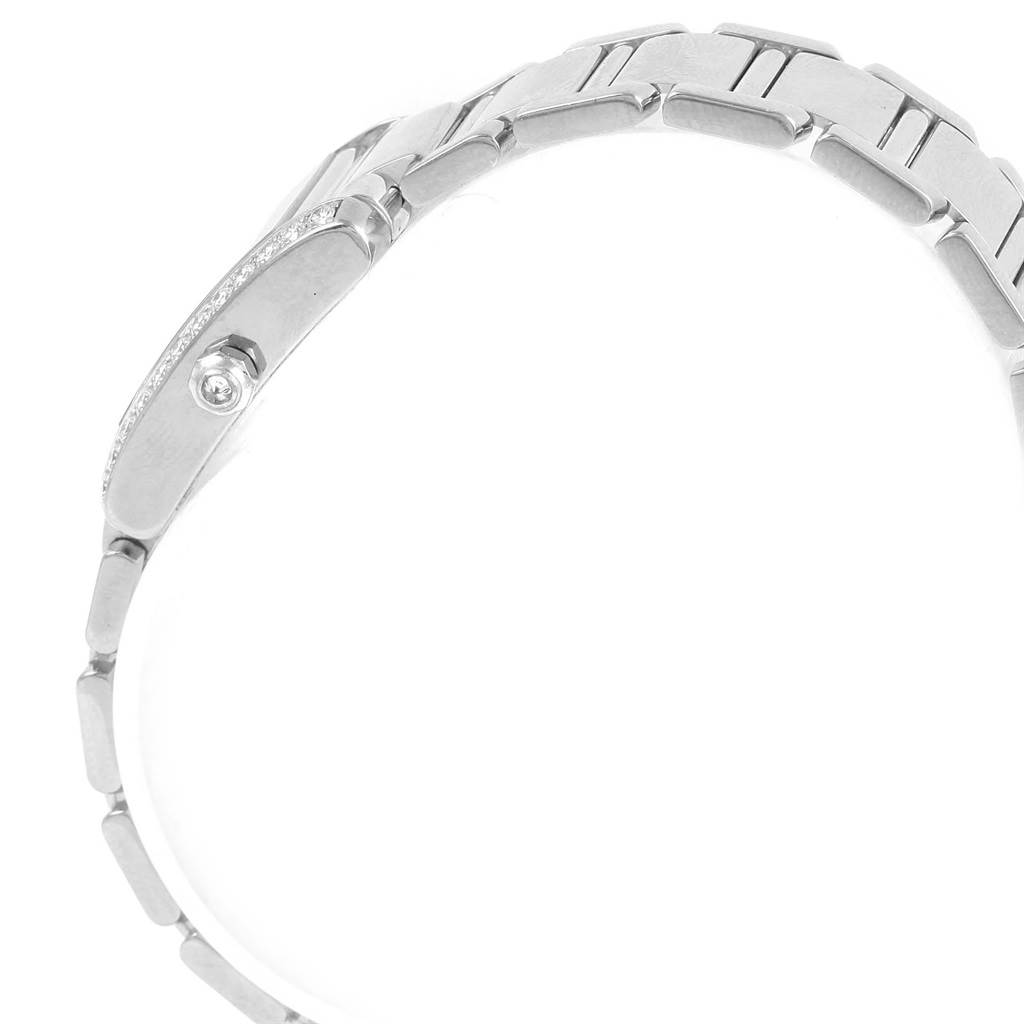 The image shows a side view of the Tank Francaise model by Cartier, highlighting its stainless steel bracelet and crown.