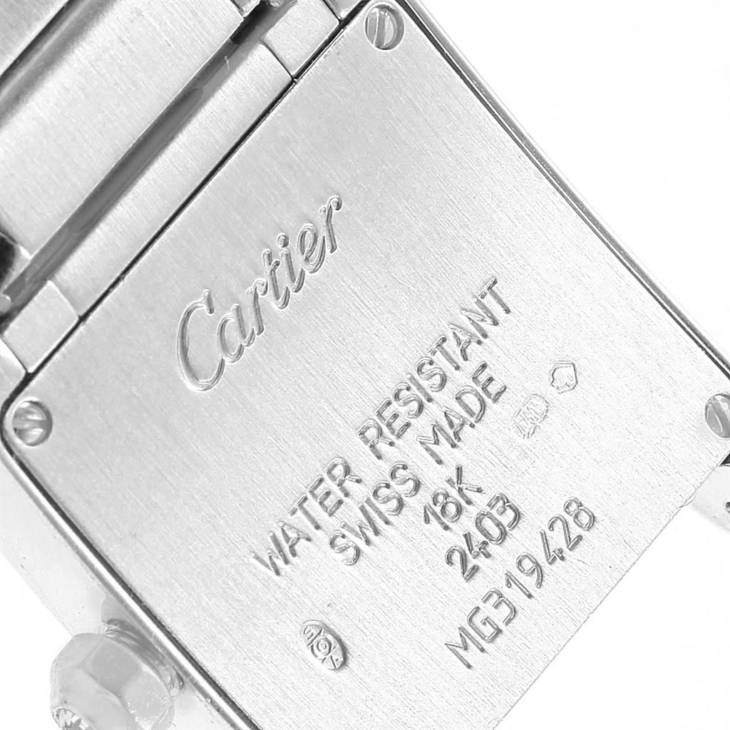 The image shows the back case of a Cartier Tank Francaise WE1002S3 Women's White Gold Silver Dial WE1002S3 Women's White Gold Silver Dial model watch, including engraved text and screws.