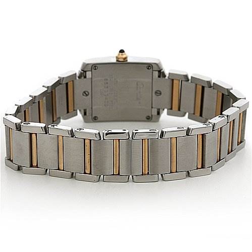 The image shows the back view of a Cartier Tank Française watch, highlighting its metal bracelet.