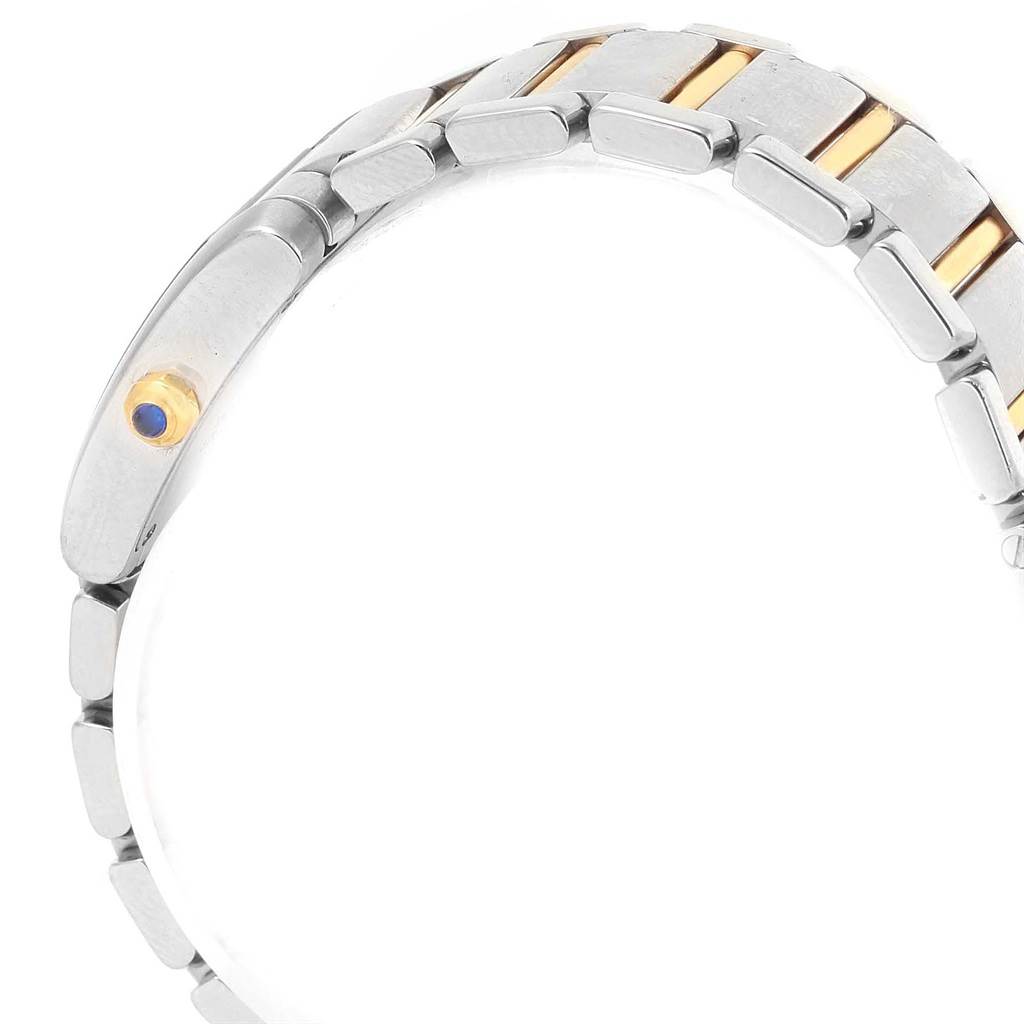 This image shows the bracelet and crown of the Cartier Tank Francaise W51007Q4 Women's Steel and Gold (two tone) Silver Dial W51007Q4 Women's Steel and Gold (two tone) Silver Dial watch from a side angle.