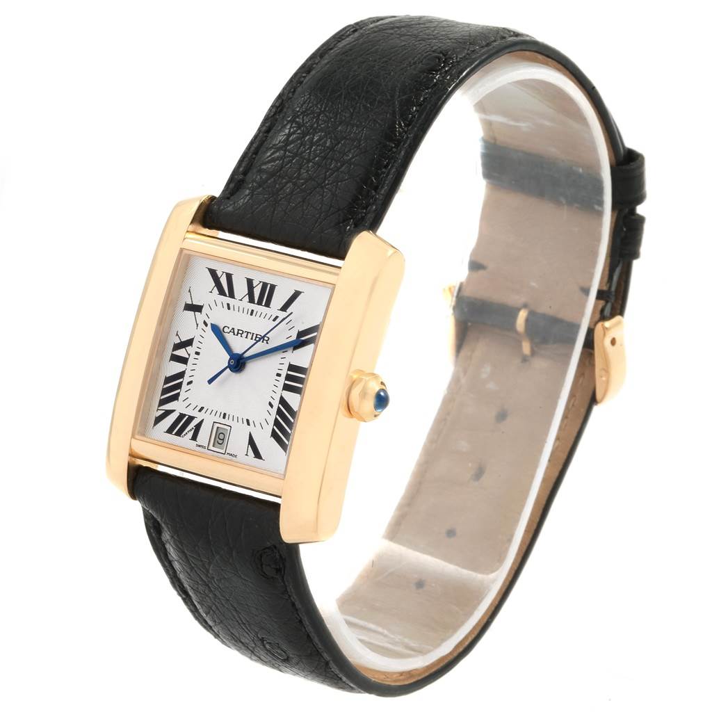 The image shows a Cartier Tank Francaise W5000156 Yellow Gold Silver Dial W5000156 Yellow Gold Silver Dial watch at a slight angle, highlighting the face, bezel, and leather strap.
