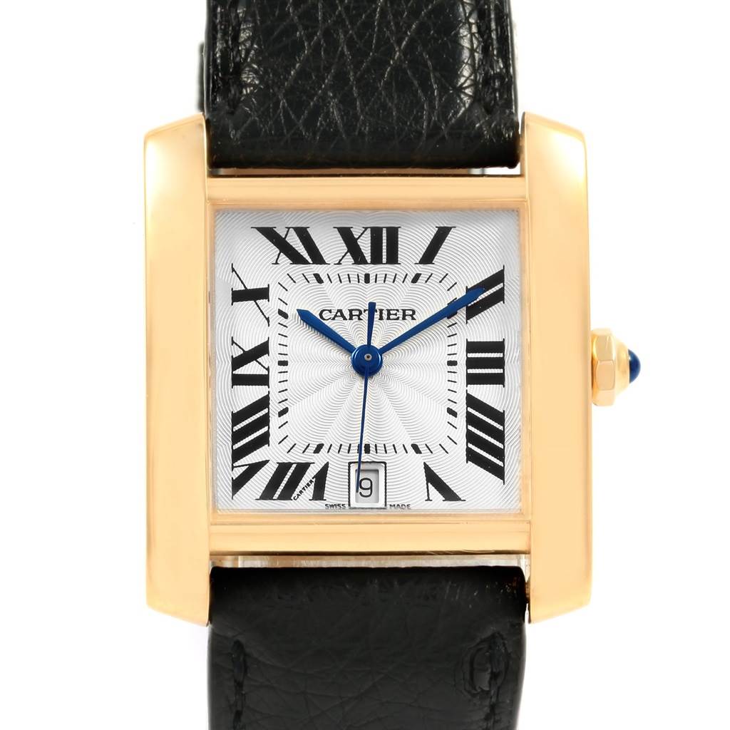 This image shows a front view of the Cartier Tank Francaise W5000156 Yellow Gold Silver Dial W5000156 Yellow Gold Silver Dial watch, highlighting the dial, hands, and leather strap.