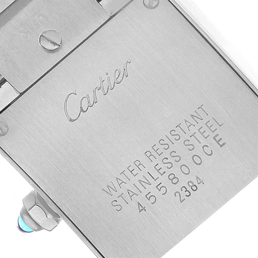 This image shows the back casing of a Cartier Tank Francaise W51008Q3 Women
s Stainless Steel Silver Dial W51008Q3 Women
s Stainless Steel Silver Dial watch, highlighting its water resistance and stainless steel material.