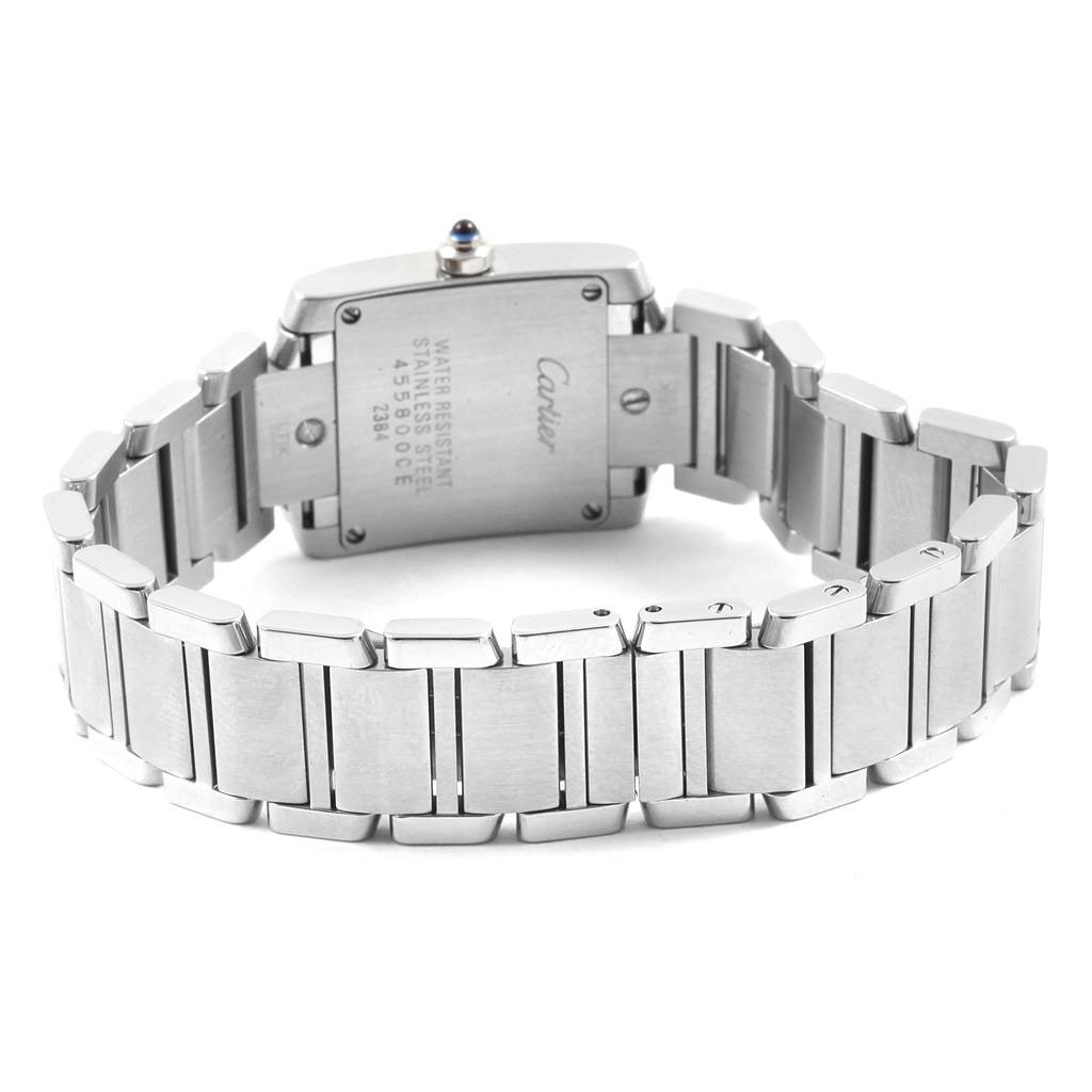 The image shows the back and part of the stainless steel bracelet of a Cartier Tank Francaise W51008Q3 Women
s Stainless Steel Silver Dial W51008Q3 Women
s Stainless Steel Silver Dial watch.