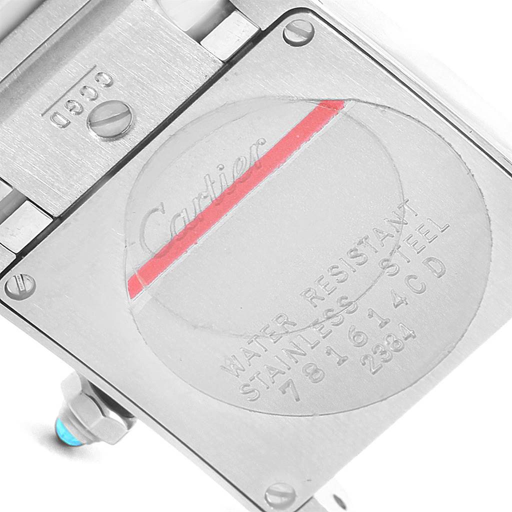 The image shows the back case of the Cartier Tank Francaise W51008Q3 Women's Stainless Steel Silver Dial W51008Q3 Women's Stainless Steel Silver Dial watch, highlighting the inscriptions and details.