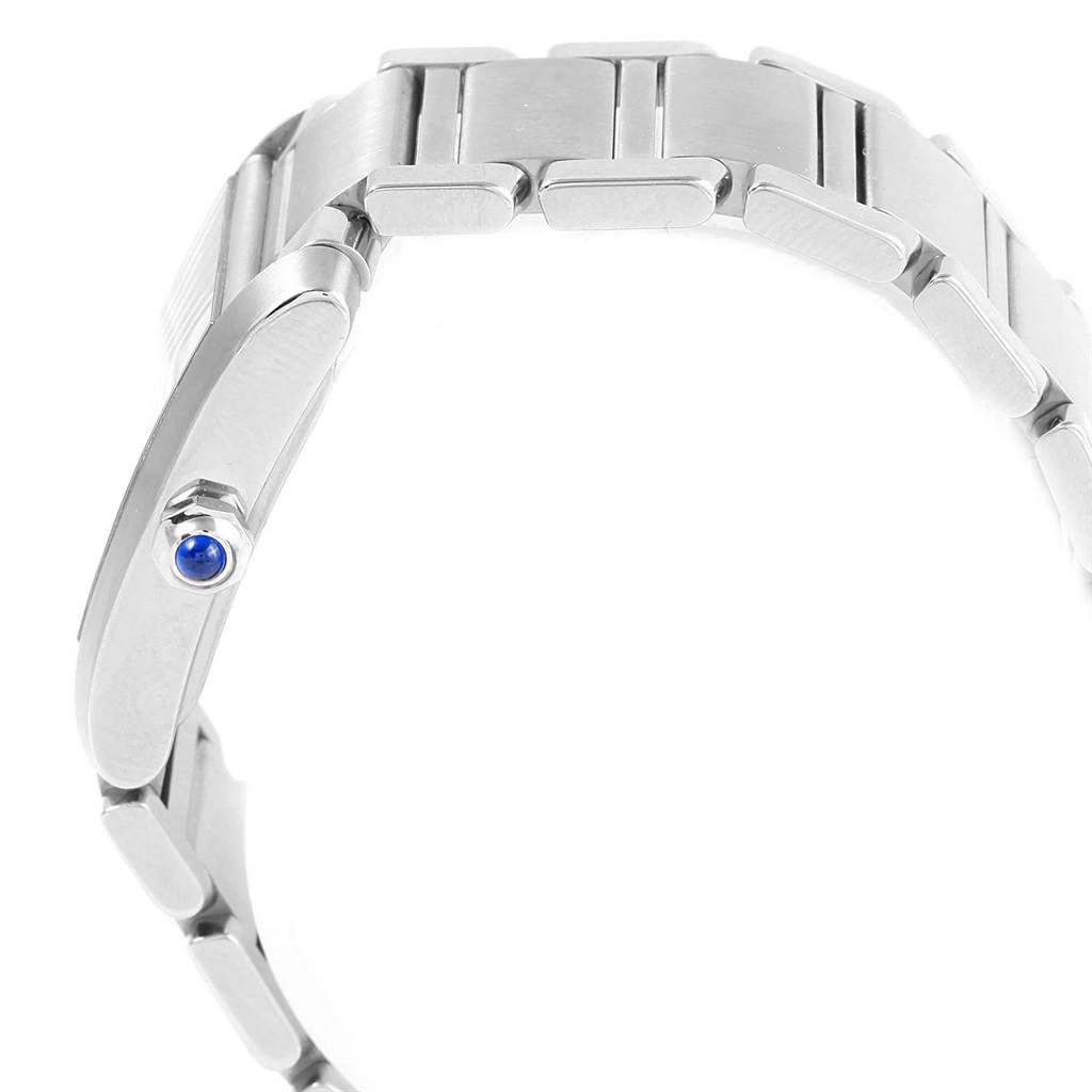 This image shows the side view of the Cartier Tank Francaise W51011Q3 Women's Stainless Steel Silver Dial W51011Q3 Women's Stainless Steel Silver Dial watch, particularly focusing on the bracelet and the crown with a blue cabochon.